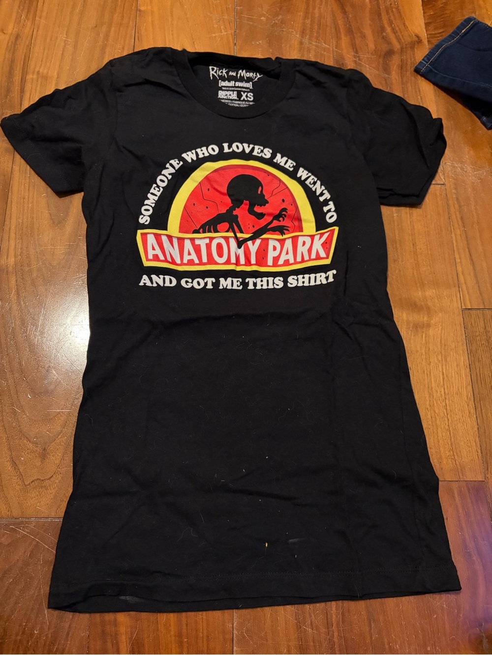 Ripple Junction Black Graphic Tee with Red & Yellow Anatomy Park Print